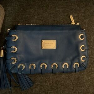 Blue Michael Kors purse with gold hardware